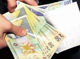 Salariul mediu net a scăzut